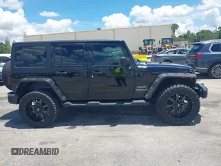 2016 Jeep Wrangler Unlimited Sport z VIN 1C4BJWDG4GL327638, wystawiony jako IAAI lot #42494615 z przebiegiem 139 371 mil mil oraz . Historia ofert i sprzedaży dostępna na DreamBid. Obrazek 13.