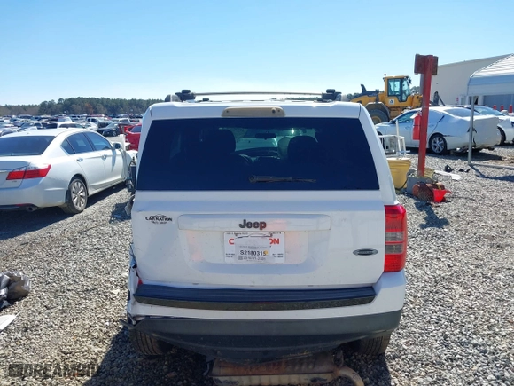 2014 Jeep Patriot Sport with VIN 1C4NJPBA9ED889186, listed as a IAAI auction lot 41738524 with 159,755 mi miles. Bid and sale history available at carsss.com. Image 16.