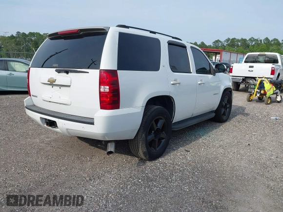 2007 Chevrolet Tahoe LS with VIN 1GNFC13J97R109226, listed as a IAAI auction lot 42304983 with 348,630 mi miles and . Bid and sale history available at DreamBid. Image 4.