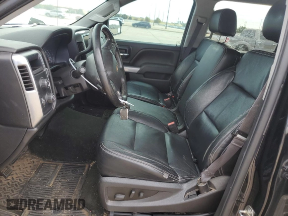2014 Chevrolet Silverado 1500 LT with VIN 3GCUKRECXEG131197, listed as a Copart auction lot 74350234 with 143,376 mi miles and Salvage Title. Bid and sale history available at DreamBid. Image 7.