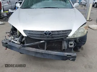 2004 Toyota Camry LE with VIN 4T1BE32K34U857725, listed as a IAAI auction lot 42131740 with 107,975 mi miles and . Bid and sale history available at DreamBid. Image 6.
