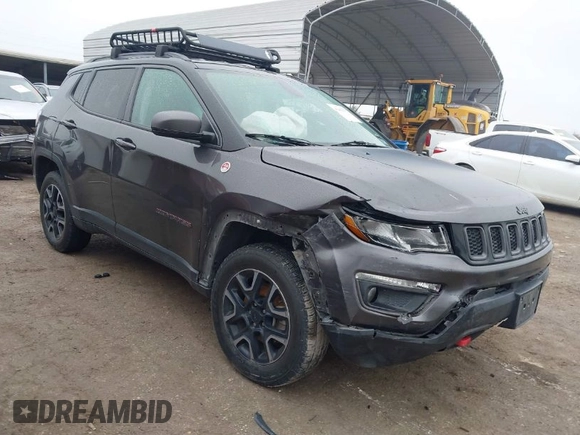 2019 Jeep Compass Trailhawk with VIN 3C4NJDDB1KT739938, listed as a IAAI auction lot 41411173 with 140,396 mi miles and . Bid and sale history available at carsss.com. Image 1.