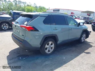 2021 Toyota RAV4 XLE with VIN JTMW1RFV8MD077146, listed as a IAAI auction lot 41970860 with 22,029 mi miles. Bid and sale history available at carsss.com. Image 4.