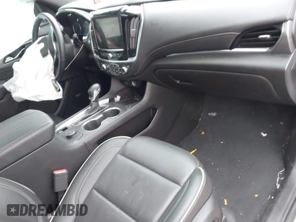 2023 Chevrolet Traverse Premier with VIN 1GNERKKW6PJ104495, listed as a IAAI auction lot 41868123 with 56,049 mi miles and . Bid and sale history available at DreamBid. Image 5.
