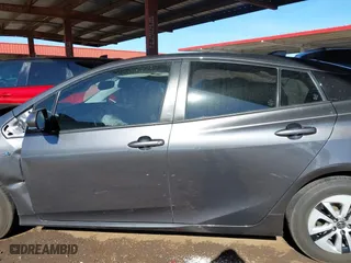 2018 Toyota Prius Two with VIN JTDKARFUXJ3062963, listed as a IAAI auction lot 41588989 with 114,842 mi miles. Bid and sale history available at carsss.com. Image 14.