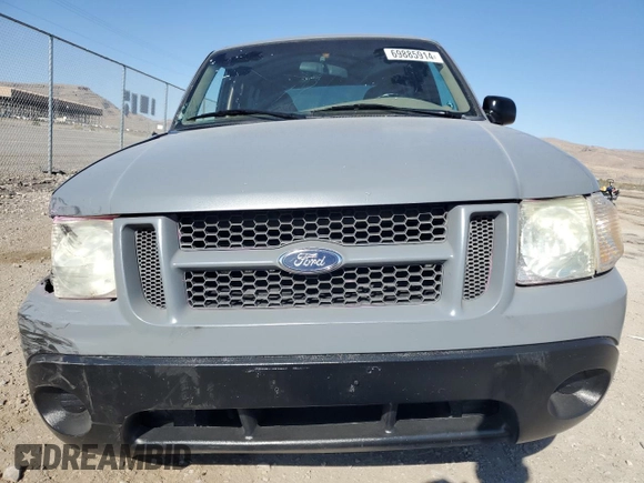 2001 Ford Explorer Sport z VIN 1FMYU70E31UA51350, wystawiony jako Copart lot #69885914 z przebiegiem 166 796 mil mil oraz Szkody całkowita. Historia ofert i sprzedaży dostępna na DreamBid. Obrazek 5.