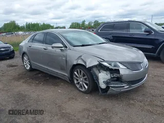 2015 Lincoln MKZ z VIN 3LN6L2J99FR604385, wystawiony jako IAAI lot #42332078 z przebiegiem 116 862 mil mil oraz . Historia ofert i sprzedaży dostępna na DreamBid. Obrazek 1.