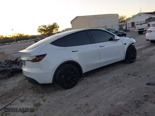 2022 Tesla Model Y Long Range with VIN 7SAYGDEE6NF313110, listed as a IAAI auction lot 41703939 with 12,468 mi miles. Bid and sale history available at carsss.com. Image 4.