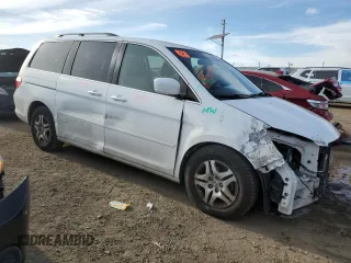 2005 Honda Odyssey EX-L with VIN 5FNRL38695B406179, listed as a Copart auction lot 47470555 with 133,448 mi miles and Salvage Title. Bid and sale history available at carsss.com. Image 4.