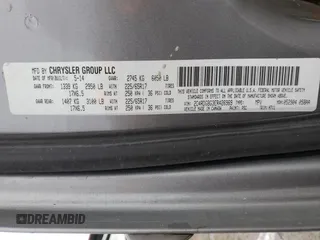 2014 Dodge Grand Caravan SE with VIN 2C4RDGBG3ER426969, listed as a Copart auction lot 43592225 with 135,423 mi miles and Salvage Title. Bid and sale history available at DreamBid. Image 13.