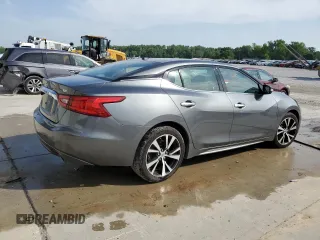 2018 Nissan Maxima SL с VIN 1N4AA6AP3JC397743, выставлен на аукционе Copart как лот 56002015 с пробегом 81 582 миль миль и Списание • Salvage title. История ставок и продаж доступна на DreamBid. Изображение 3.