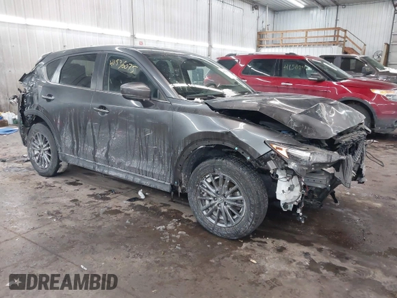 2020 Mazda CX-5 Touring with VIN JM3KFBCM0L0843242, listed as a IAAI auction lot 41536075 with 31,849 mi miles. Bid and sale history available at carsss.com. Image 1.