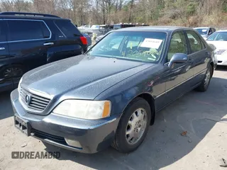 2004 Acura RL w/Navigation System with VIN JH4KA96634C006366, listed as a IAAI auction lot 42054689 with 350,809 mi miles. Bid and sale history available at carsss.com. Image 2.