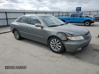2006 Hyundai Azera SE z VIN KMHFC46F76A054625, wystawiony jako Copart lot #56588315 z przebiegiem 178 667 mil mil oraz Szkoda całkowita • Salvage title. Historia ofert i sprzedaży dostępna na DreamBid. Obrazek 4.