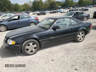 1999 Mercedes-Benz SL-Class with VIN WDBFA68F3XF187095, listed as a Copart auction lot 74514554 with 131,352 mi miles and Salvage Title. Bid and sale history available at carsss.com. Image 1.