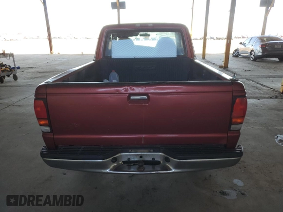 1999 Mazda B-Series 2WD Truck SE with VIN 4F4YR16V0XTM10024, listed as a Copart auction lot 82905694 with 163,025 mi miles and Salvage Title. Bid and sale history available at carsss.com. Image 6.