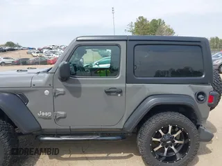 2021 Jeep Wrangler Sport z VIN 1C4GJXAN3MW550665, wystawiony jako IAAI lot #41902279 z przebiegiem 32 250 mil mil oraz . Historia ofert i sprzedaży dostępna na DreamBid. Obrazek 14.