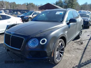 2019 Bentley Bentayga V8 z VIN SJAAM2ZV9KC024576, wystawiony jako IAAI lot #41713477 z przebiegiem 29 631 mil mil oraz . Historia ofert i sprzedaży dostępna na DreamBid. Obrazek 2.