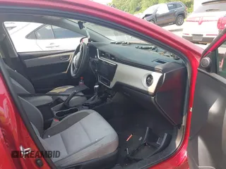 2018 Toyota Corolla L with VIN 2T1BURHE9JC965125, listed as a IAAI auction lot 42404116 with 91,219 mi miles and . Bid and sale history available at DreamBid. Image 5.