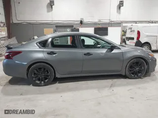 2018 Nissan Altima 2.5 SV with VIN 1N4AL3AP5JC470135, listed as a IAAI auction lot 41801045 with 122,452 mi miles. Bid and sale history available at carsss.com. Image 13.