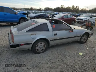 1984 Nissan 300ZX z VIN JN1HZ16S5EX016042, wystawiony jako Copart lot #86071904 z przebiegiem Nie podano mil oraz Szkoda całkowita • Salvage title. Historia ofert i sprzedaży dostępna na DreamBid. Obrazek 3.