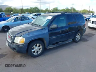 2002 GMC Envoy SLE z VIN 1GKDS13S922523317, wystawiony jako IAAI lot #42374259 z przebiegiem 185 686 mil mil oraz . Historia ofert i sprzedaży dostępna na DreamBid. Obrazek 2.