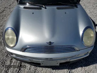 2002 MINI Hardtop with VIN WMWRC33472TC34281, listed as a Copart auction lot 71631644 with 196,947 mi miles and Salvage Title. Bid and sale history available at DreamBid. Image 12.