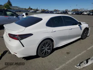 2023 Toyota Camry SE with VIN 4T1G11AK2PU799683, listed as a Copart auction lot 48240755 with 32,331 mi miles and Salvage Title. Bid and sale history available at DreamBid. Image 3.