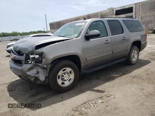 2012 Chevrolet Suburban with VIN 1GNWKMEG3CR211461, listed as a Copart auction lot 51816794 with 187,088 mi miles and Salvage title. Bid and sale history available at DreamBid. Image 1.
