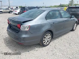 2013 Volkswagen Jetta SE with VIN 3VWDX7AJXDM255977, listed as a IAAI auction lot 42194447 with 120,921 mi miles and . Bid and sale history available at DreamBid. Image 4.