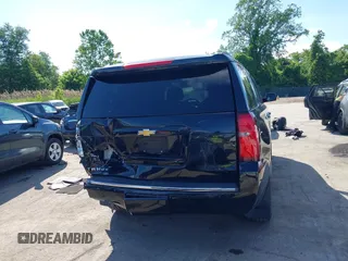 2015 Chevrolet Tahoe LTZ z VIN 1GNSKCKC3FR104845, wystawiony jako IAAI lot #42291785 z przebiegiem 75 047 mil mil oraz . Historia ofert i sprzedaży dostępna na DreamBid. Obrazek 16.