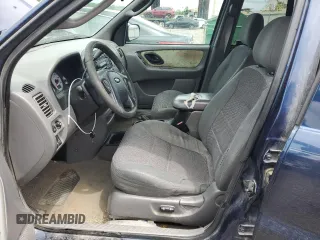 2002 Ford Escape XLT Choice with VIN 1FMYU04192KD87001, listed as a Copart auction lot 57860475 with 195,323 mi miles and Salvage title. Bid and sale history available at DreamBid. Image 7.