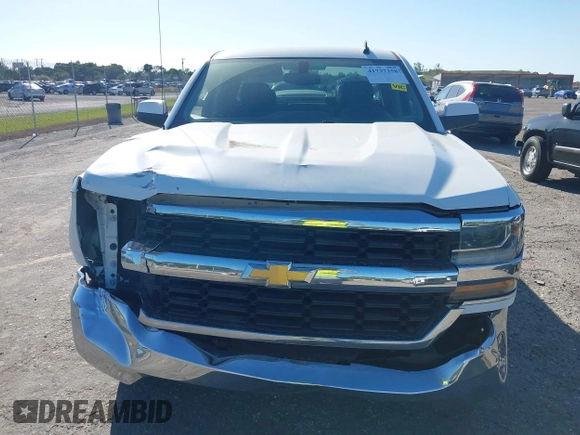 2018 Chevrolet Silverado 1500 LT with VIN 1GCRCREC1JZ153165, listed as a IAAI auction lot 41737258 with 130,475 mi miles and . Bid and sale history available at DreamBid. Image 13.