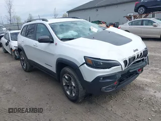 2019 Jeep Cherokee Trailhawk Elite with VIN 1C4PJMBX4KD351261, listed as a IAAI auction lot 41944727 with 97,849 mi miles. Bid and sale history available at carsss.com. Image 14.