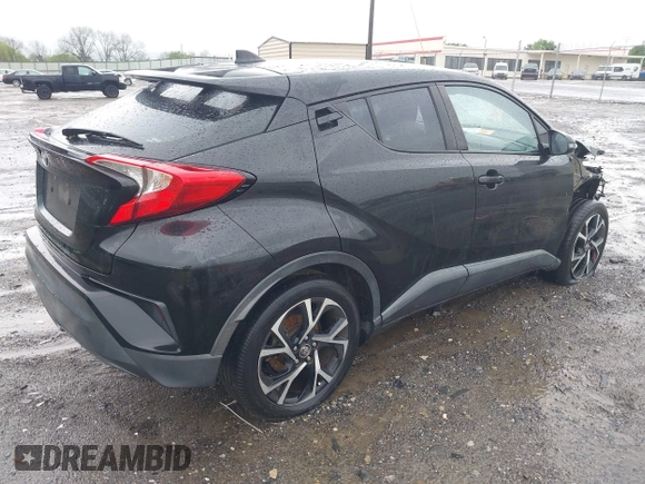 2018 Toyota C-HR XLE with VIN NMTKHMBX4JR032773, listed as a IAAI auction lot 41957588 with 100,691 mi miles. Bid and sale history available at carsss.com. Image 4.