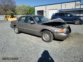2001 Mercury Grand Marquis LS with VIN 2MEFM75W61X660369, listed as a Copart auction lot 48666655 with 120,590 mi miles and Salvage Title. Bid and sale history available at carsss.com. Image 10.