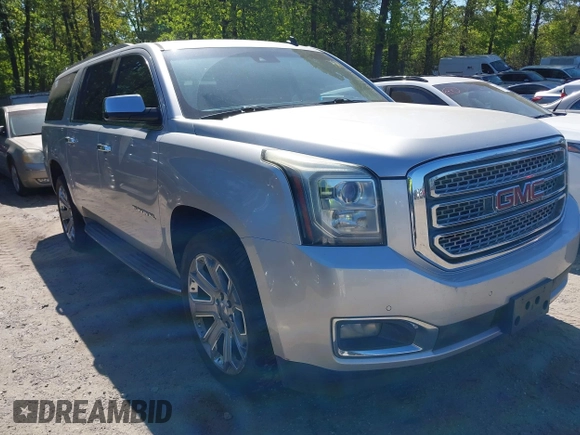 2015 GMC Yukon XL SLT with VIN 1GKS1HKC8FR221608, listed as a IAAI auction lot 42044318 with 215,757 mi miles. Bid and sale history available at carsss.com. Image 1.