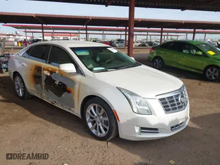 2014 Cadillac XTS Luxury with VIN 2G61M5S35E9199253, listed as a IAAI auction lot 41400558 with 112,955 mi miles. Bid and sale history available at carsss.com. Image 1.