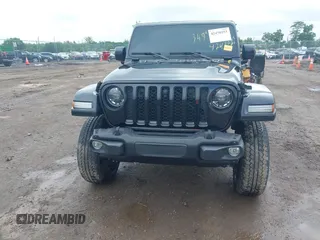 2023 Jeep Gladiator Overland with VIN 1C6JJTFM9PL593659, listed as a IAAI auction lot 42470253 with 34,374 mi miles and . Bid and sale history available at DreamBid. Image 20.