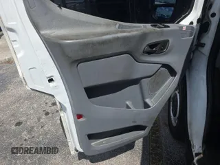 2019 Ford Transit with VIN 1FTYE1YM8KKB28303, listed as a IAAI auction lot 42241289 with 212,376 mi miles and . Bid and sale history available at DreamBid. Image 6.