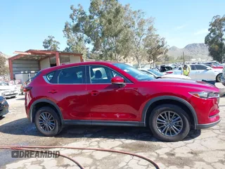 2019 Mazda CX-5 Sport with VIN JM3KFABM0K1633065, listed as a IAAI auction lot 41968786 with 90,407 mi miles and . Bid and sale history available at DreamBid. Image 13.
