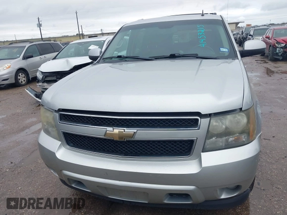 2011 Chevrolet Suburban LS with VIN 1GNSCHE06BR188407, listed as a IAAI auction lot 41453215 with 232,667 mi miles. Bid and sale history available at carsss.com. Image 12.