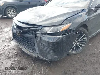 2018 Toyota Camry LE z VIN 4T1B11HK5JU649736, wystawiony jako IAAI lot #41536240 z przebiegiem 20 330 mil mil oraz . Historia ofert i sprzedaży dostępna na DreamBid. Obrazek 16.