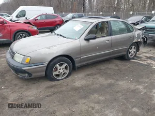 1998 Toyota Avalon XL with VIN 4T1BF18B7WU256930, listed as a IAAI auction lot 41297552 with 210,745 mi miles and . Bid and sale history available at DreamBid. Image 18.