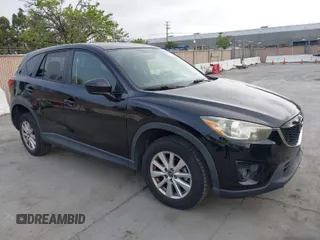 2014 Mazda CX-5 Touring with VIN JM3KE2CY9E0317278, listed as a IAAI auction lot 41991778 with 130,122 mi miles. Bid and sale history available at carsss.com. Image 1.