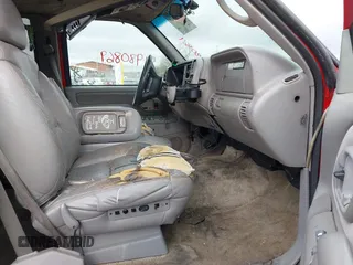1998 GMC Yukon with VIN 1GKEK13R0WJ703105, listed as a IAAI auction lot 41980869 with 302,546 mi miles. Bid and sale history available at carsss.com. Image 5.