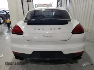 2016 Porsche Panamera 4 z VIN WP0AA2A71GL001868, wystawiony jako Copart lot #55299865 z przebiegiem 188 141 mil mil oraz Czysty tytuł • Clean title. Historia ofert i sprzedaży dostępna na DreamBid. Obrazek 6.