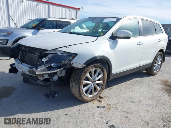 2014 Mazda CX-9 Grand Touring with VIN JM3TB3DA8E0427369, listed as a IAAI auction lot 41860129 with 152,888 mi miles and . Bid and sale history available at DreamBid. Image 18.