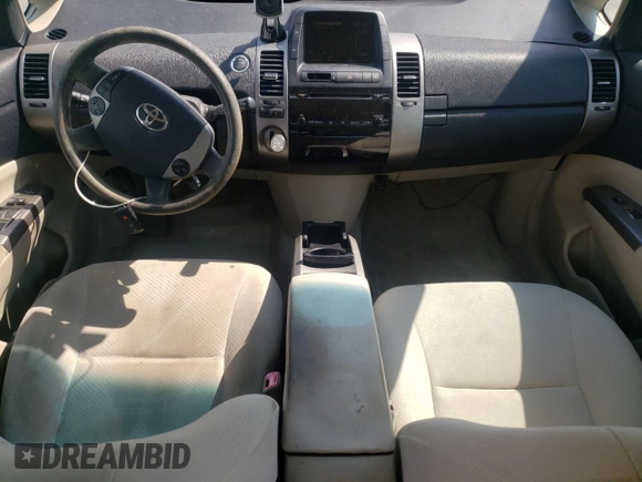 2007 Toyota Prius z VIN JTDKB20U273283642, wystawiony jako Copart lot #55244125 z przebiegiem 144 123 mil mil oraz Szkoda całkowita • Salvage title. Historia ofert i sprzedaży dostępna na DreamBid. Obrazek 8.