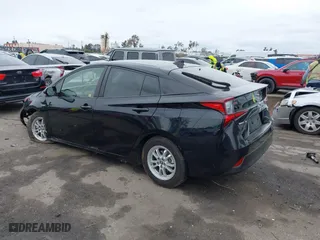 2019 Toyota Prius L Eco with VIN JTDKARFU6K3074058, listed as a IAAI auction lot 41741499 with 70,834 mi miles. Bid and sale history available at carsss.com. Image 3.